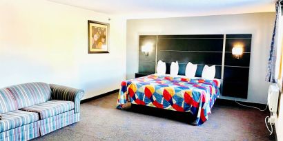 Spacious day use room with natural light at Coratel Inn & Suites By Jasper Northfield.