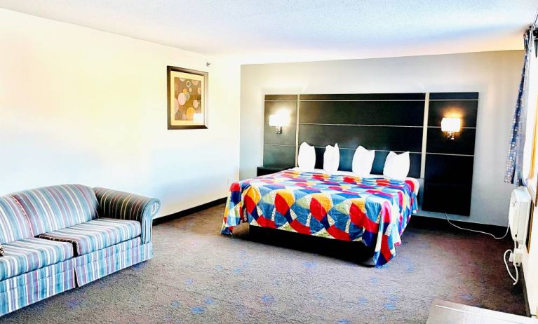 Spacious day use room with natural light at Coratel Inn & Suites By Jasper Northfield.