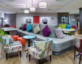 Lounge and coworking space at Home2 Suites By Hilton Charleston Airport/Convention Center.