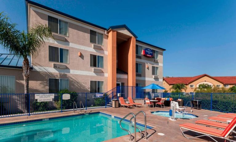 Refreshing outdoor pool and hot tub at Fairfield Inn By Marriott Santa Clarita Valencia.

