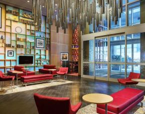 Lobby and coworking space at Hampton Inn Manhattan/Times Square Central.