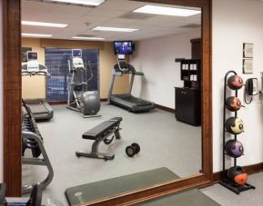 Well equipped fitness center at Homewood Suites By Hilton Denton.