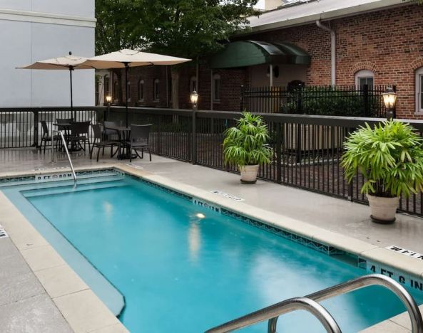 Stunning outdoor pool at Hampton Inn & Suites Gainesville-Downtown.