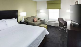 Day use room with work desk and natural light at Hampton Inn & Suites Gainesville-Downtown.