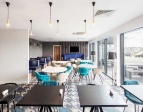 Dining and coworking space at Hampton By Hilton Humberside Airport.
