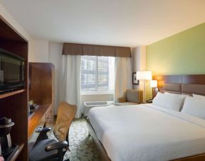 King room with TV and work station at Hilton Garden Inn New York/Manhattan-Midtown East.