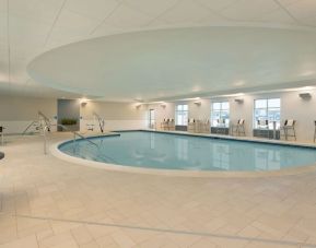 Relaxing indoor pool at Hampton Inn & Suites Rosemont Chicago O'Hare.