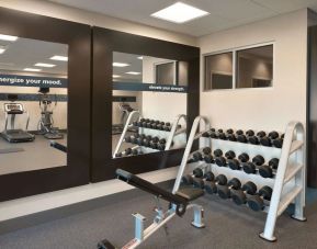 Equipped fitness center at Hampton Inn & Suites Rosemont Chicago O'Hare.