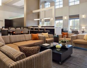 Lounge and coworking space at Hampton Inn & Suites Rosemont Chicago O'Hare.