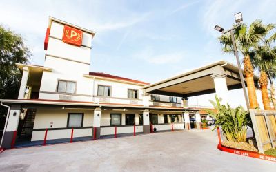 Hotel exterior at Palace Inn TX 249.