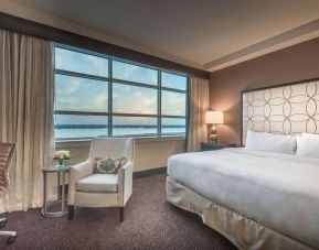 Delux king room with natural light at Hilton Baton Rouge Capitol Center.