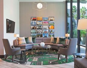 Lounge and coworking space at H Hotel Los Angeles, Curio Collection By Hilton.