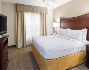 Delux king room with TV at Homewood Suites By Hilton Shreveport.