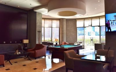 Lounge and coworking space at Millennium Central Doha.