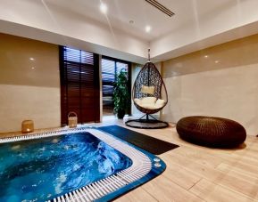 Hot tub and spa available at Millennium Hotel Doha.
