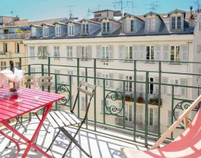 Stunning outdoor terrace overlooking the city at Aparthotel AMMI Nice Massena.