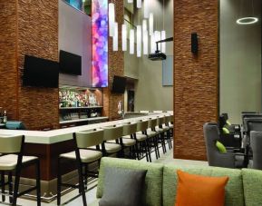 Bar and coworking space at Homewood Suites By Hilton Calgary Downtown.