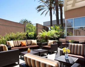 Relaxing outdoor lounge and coworking space at Sonesta Emeryville - San Francisco Bay Bridge.
