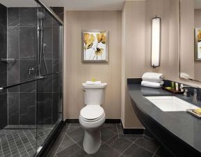 Guest bathroom with shower at Hilton Short Hills.