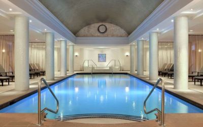 Stunning indoor pool with pool chairs at Hilton Short Hills.