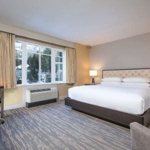 King room with TV at Hilton Whistler Resort & Spa.
