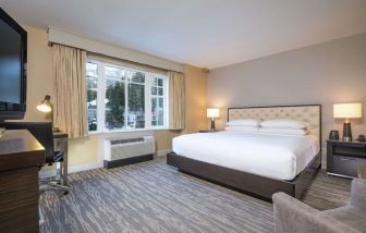 King room with TV at Hilton Whistler Resort & Spa.