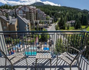 Day rooms with balcony and seating area at Hilton Whistler Resort & Spa.