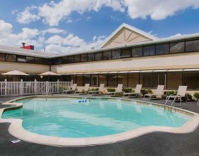 Relaxing outdoor pool area at Ramada By Wyndham Boston.