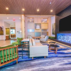 Lobby and coworking lounge at Fairfield Inn & Suites By Marriott Houston League City.