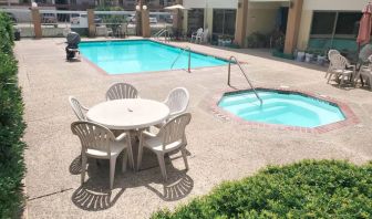 Refreshing outdoor pool at Coratel Inn & Suites By Jasper New Braunfels IH-35 EXT 189.
