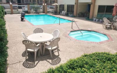 Refreshing outdoor pool at Coratel Inn & Suites By Jasper New Braunfels IH-35 EXT 189.