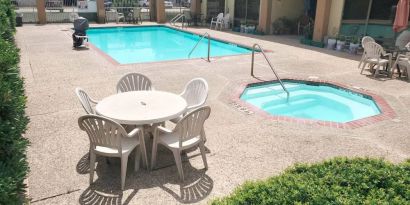 Refreshing outdoor pool at Coratel Inn & Suites By Jasper New Braunfels IH-35 EXT 189.