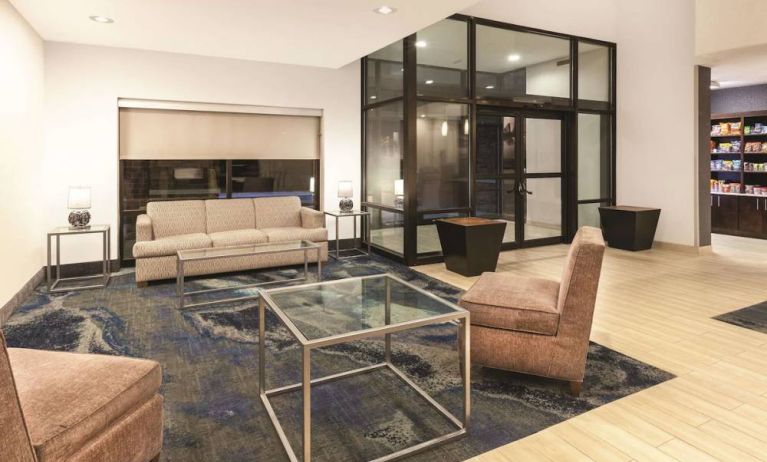 Lobby and coworking lounge at La Quinta Inn & Suites By Wyndham Philadelphia Airport.