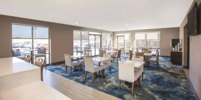 Breakfast area perfect for coworking at La Quinta Inn & Suites By Wyndham Philadelphia Airport.