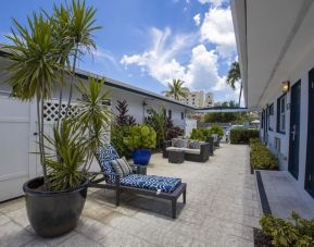 Relaxing outdoor terrace at Hollywood Beach Suites, A South Beach Group Hotel.