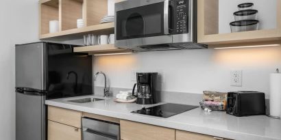 In-room kitchen at TownePlace Suites Nashville Midtown.