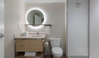 Guest bathroom with shower at TownePlace Suites Nashville Midtown.