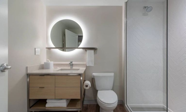 Guest bathroom with shower at TownePlace Suites Nashville Midtown.