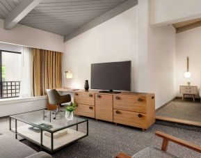 Day use room with TV and lounge area at Hilton Scottsdale Resort & Villas.