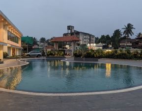 Relaxing outdoor pool at Mayur Belgaum Presidency Hotel & Spa.