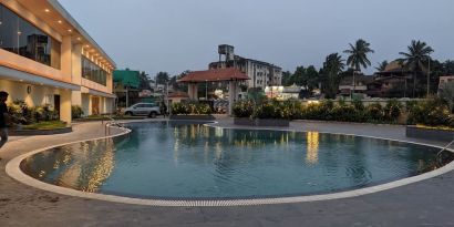 Relaxing outdoor pool at Mayur Belgaum Presidency Hotel & Spa.