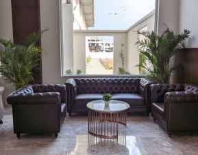 Lobby and coworking space at Mayur Belgaum Presidency Hotel & Spa.