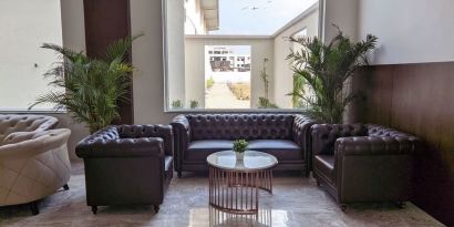 Lobby and coworking space at Mayur Belgaum Presidency Hotel & Spa.