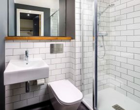 Guest bathroom with shower at Ibis Budget Sheffield Centre St Marys Gate.