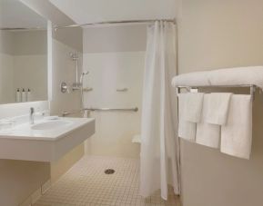 Private bathroom with shower at SpringHill Suites Newark Liberty Int. Airpt.