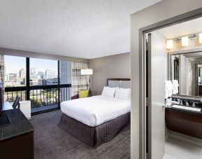 Bright king room with TV at Crowne Plaza Atlanta-Midtown.