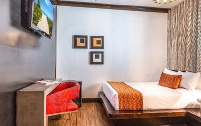 Delux king room with TV at Hotel Chelsea, A South Beach Group Hotel.