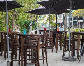 Hotel terrace with seating area at Hotel Chelsea, A South Beach Group Hotel.