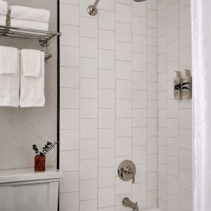 Private guest bathroom with shower at Romer Hell's Kitchen.