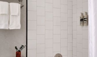 Private guest bathroom with shower at Romer Hell's Kitchen.